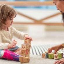 Young girl playing with blocks