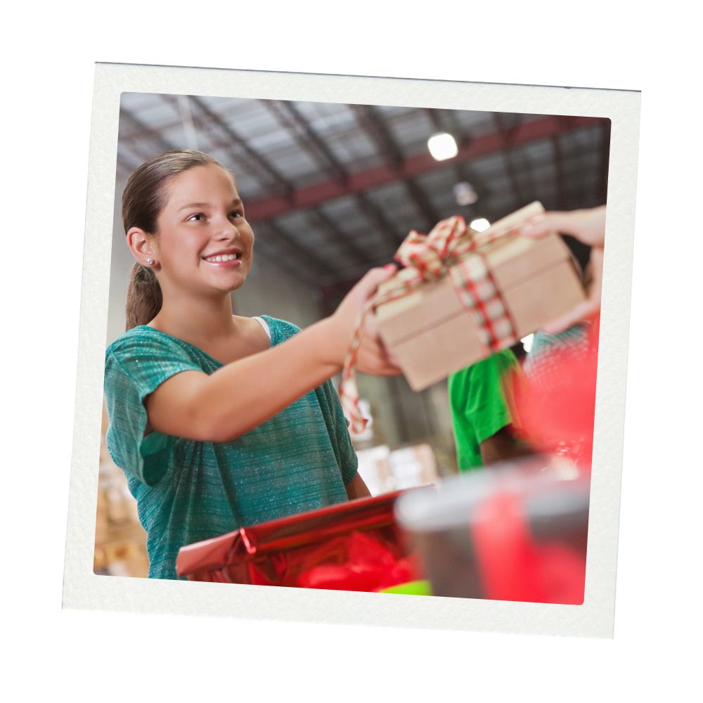 A teenage girl accepts a gift at a toy drive in Colorado