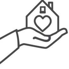 Hand holding a house